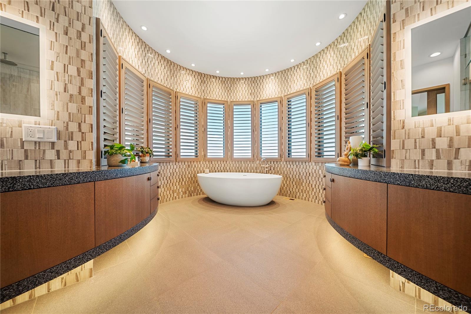 12565 Picadilly Road Commerce City, CO 80022 - Photo 22 of 50 a spacious bedroom with a bed and a large window