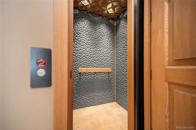 a view of a door and a window