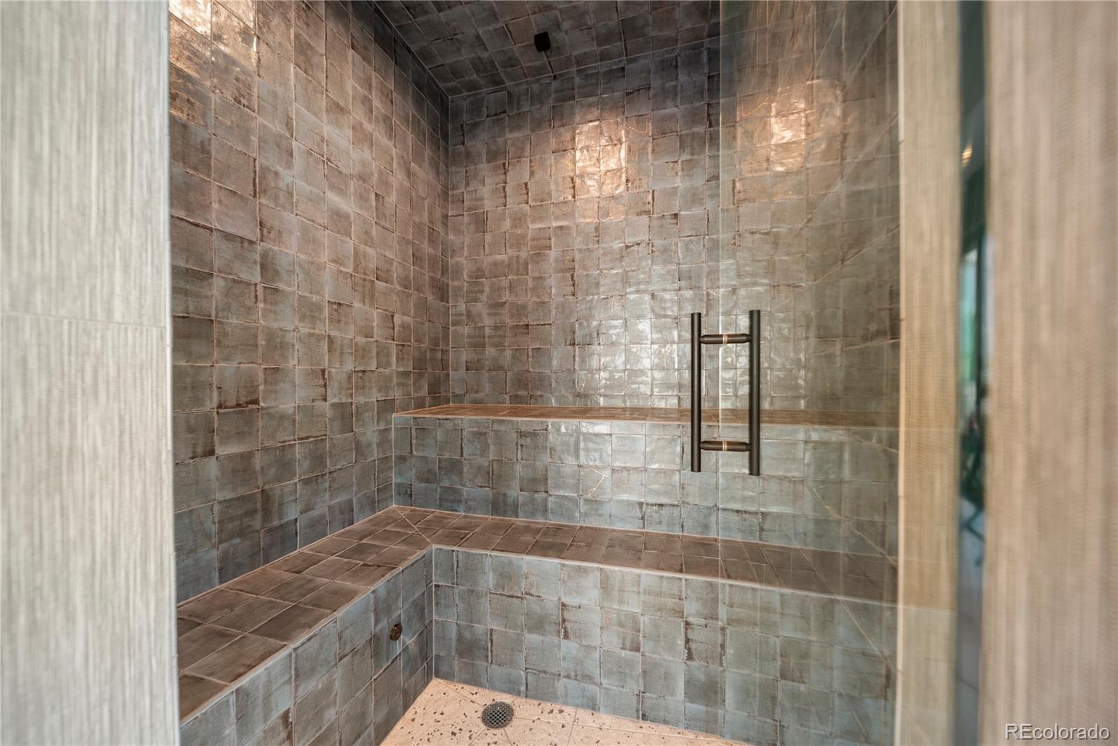 12565 Picadilly Road Commerce City, CO 80022 - Photo 43 of 50 a bathroom with a shower