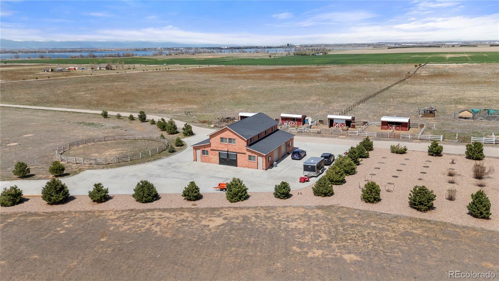 12565 Picadilly Road Commerce City, CO 80022 - Photo 48 of 50 an aerial view of a house with outdoor space and ocean view