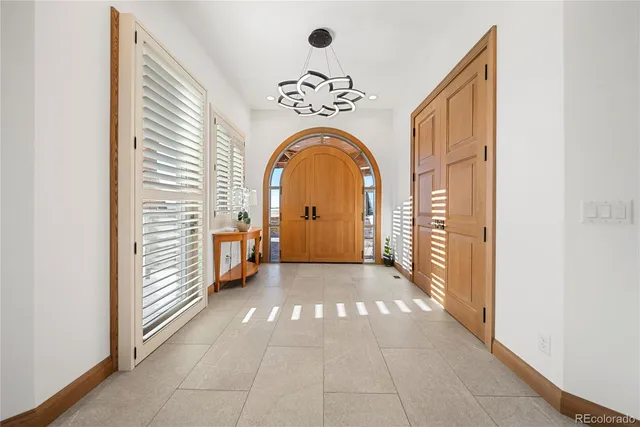 a view of a entryway door of the room