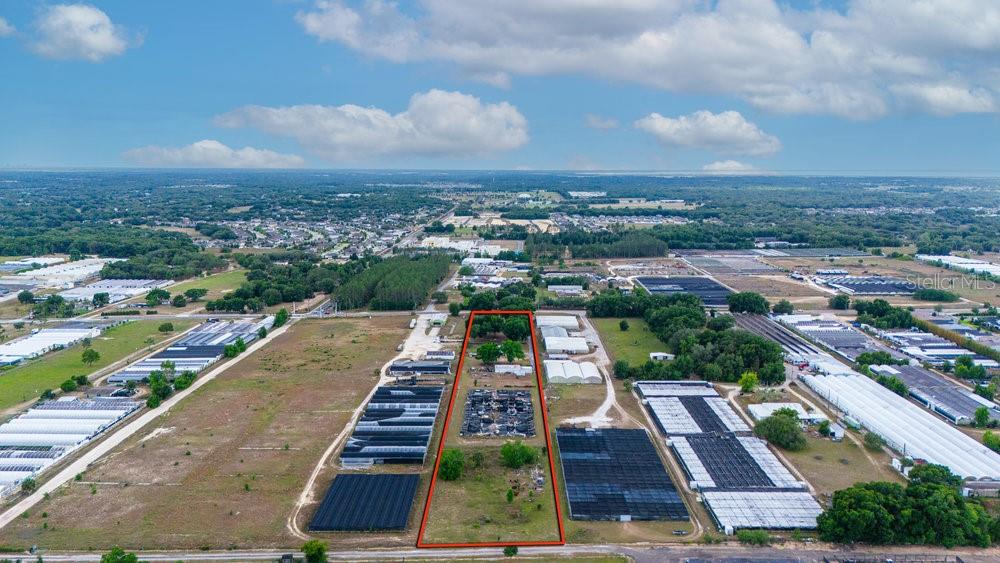 2103 West Kelly Park Road Apopka, FL 32712 - Photo 4 of 24 a view of a city