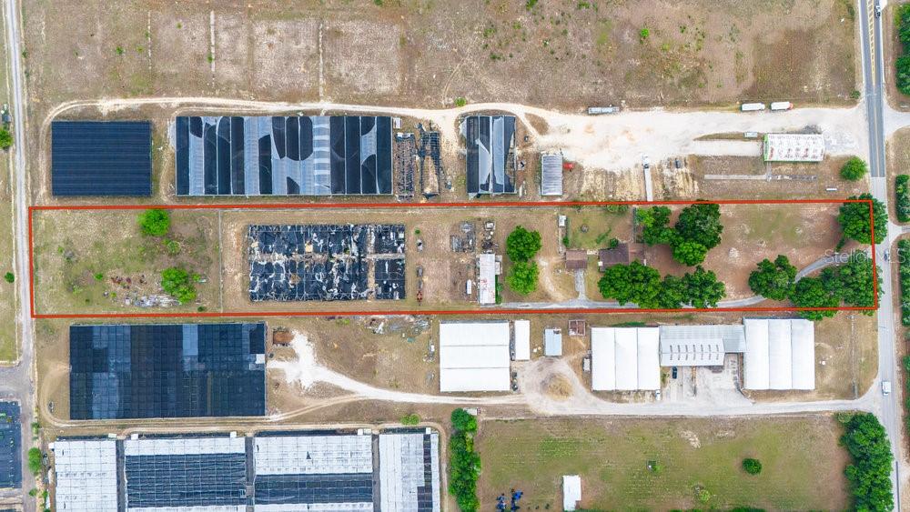 2103 West Kelly Park Road Apopka, FL 32712 - Photo 5 of 24 a view of a house with a window