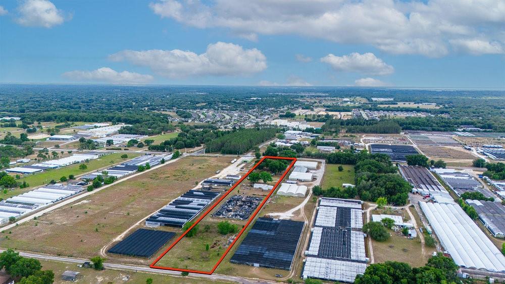 2103 West Kelly Park Road Apopka, FL 32712 - Photo 6 of 24 an aerial view of residential building