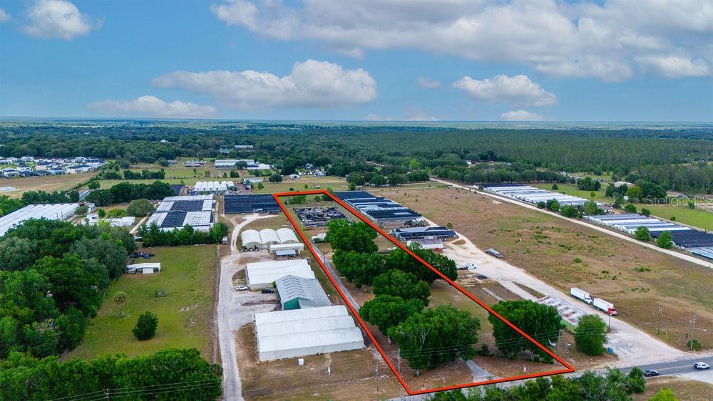 2103 West Kelly Park Road Apopka, FL 32712 - Photo 8 of 24 an aerial view of a city