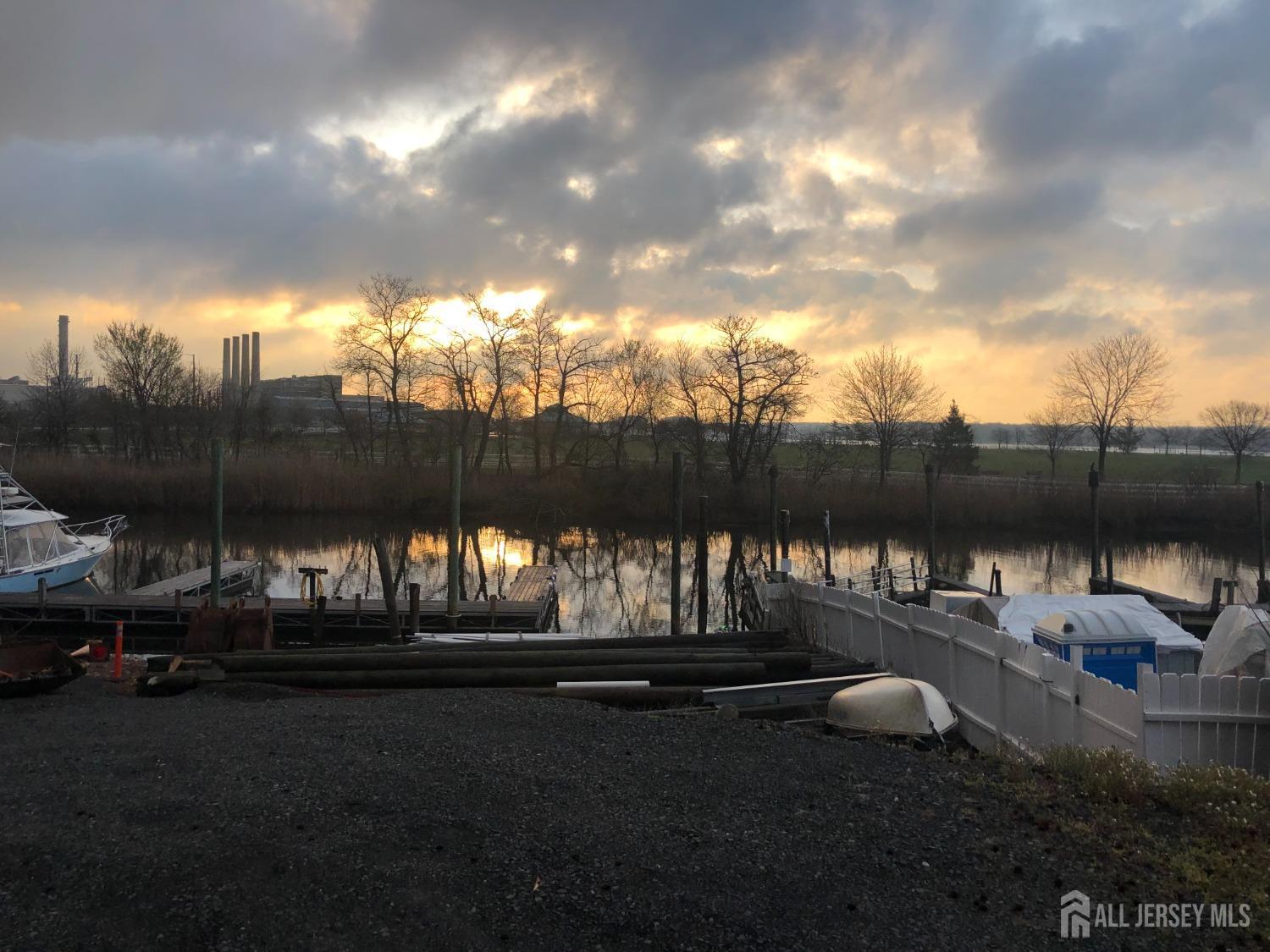 566 Cliff Road, Unit C Sewaren, NJ 07077 - Photo 14 of 14 a view of a back yard