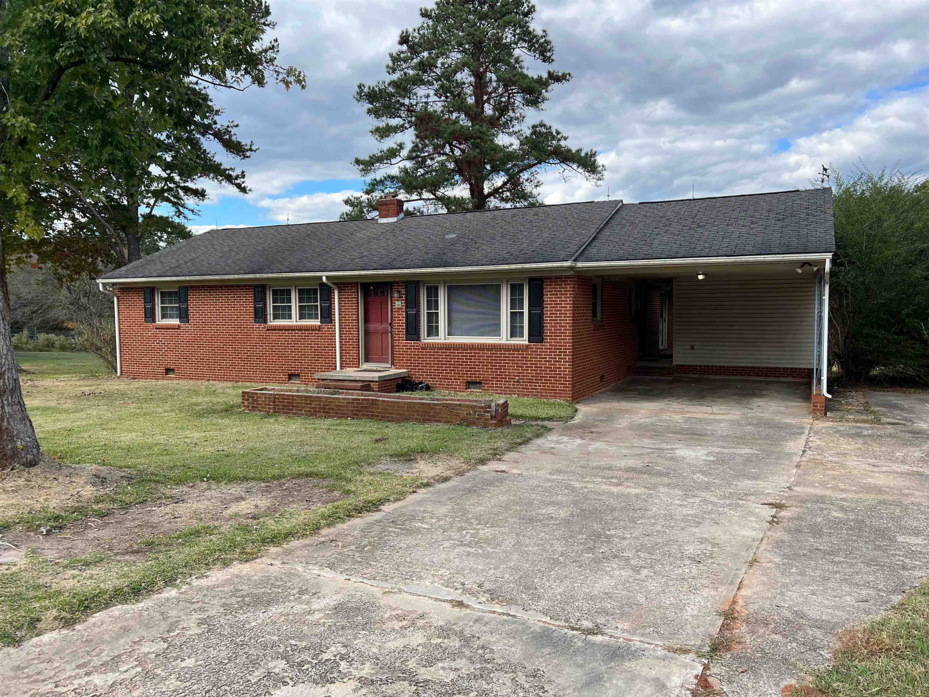 629 Rand Road Garner, NC 27529 - Photo 2 of 27 front view of house with a yard