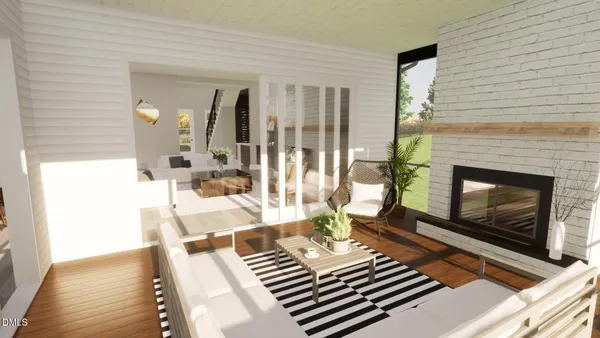 a living room with furniture a fireplace and a table