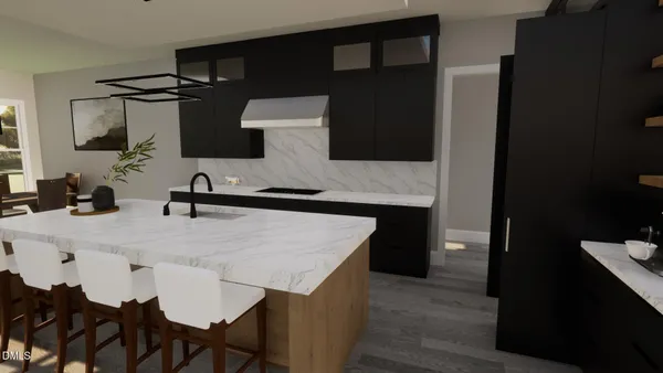 a kitchen with kitchen island a counter top space appliances and cabinets