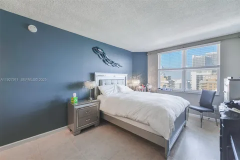 a room with lots of different colored cloths