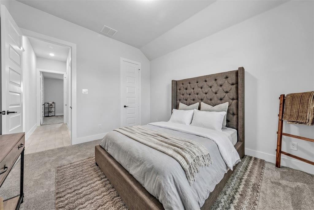 2004 Willy Dilly Road Springtown, TX 76082 - Photo 31 of 40 Carpeted flooring, white walls, white doors with dark hardware, recessed lighting