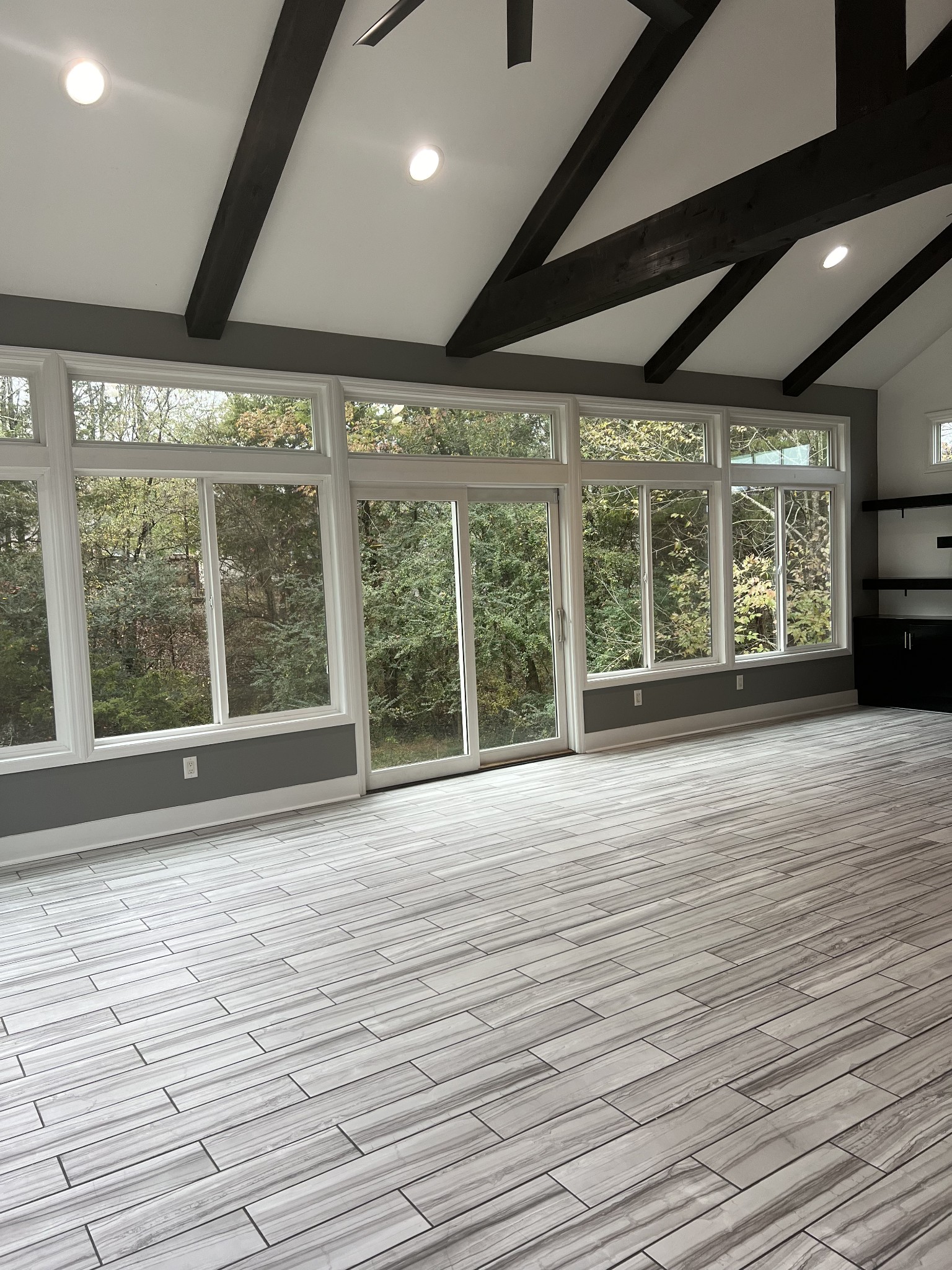 4266 Birmingham Road Lebanon, TN 37090 - Photo 21 of 24 a view of an empty room with wooden floor and a window