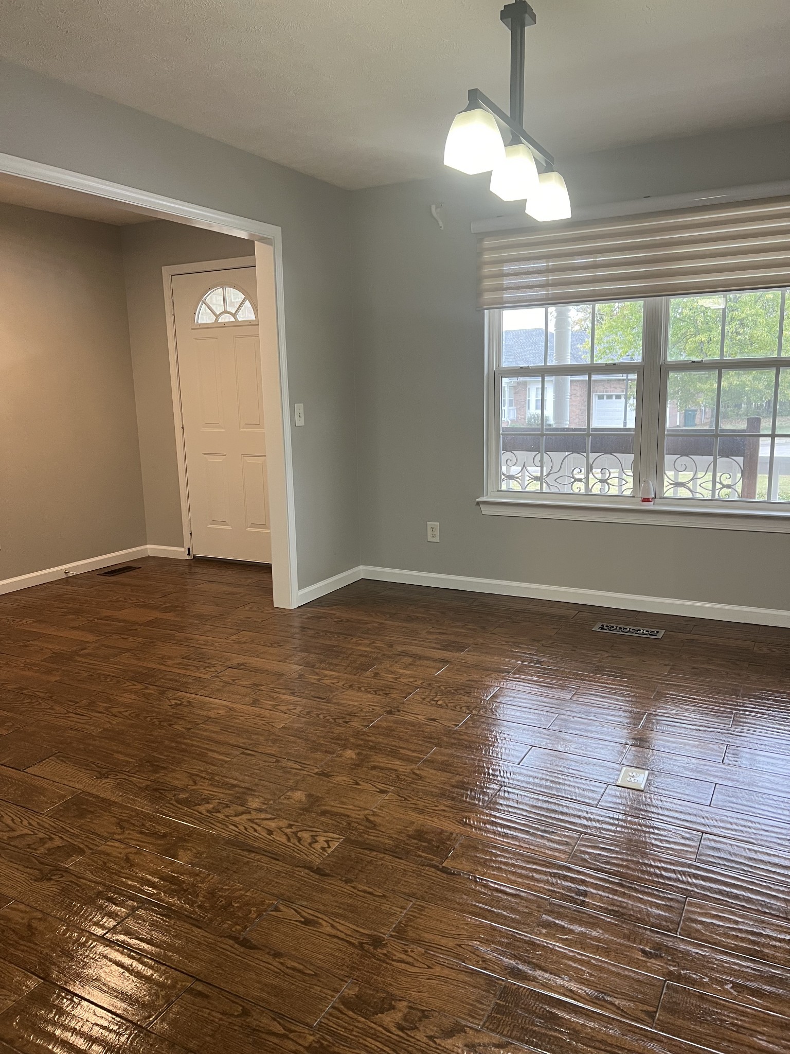 4266 Birmingham Road Lebanon, TN 37090 - Photo 5 of 24 an empty room with wooden floor and windows