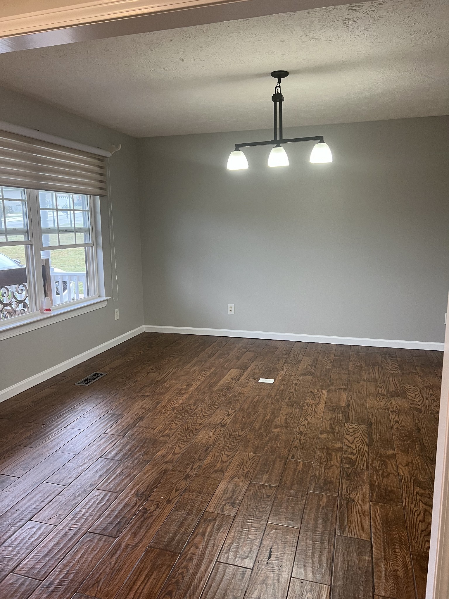 4266 Birmingham Road Lebanon, TN 37090 - Photo 6 of 24 wooden floor in an empty room with a window