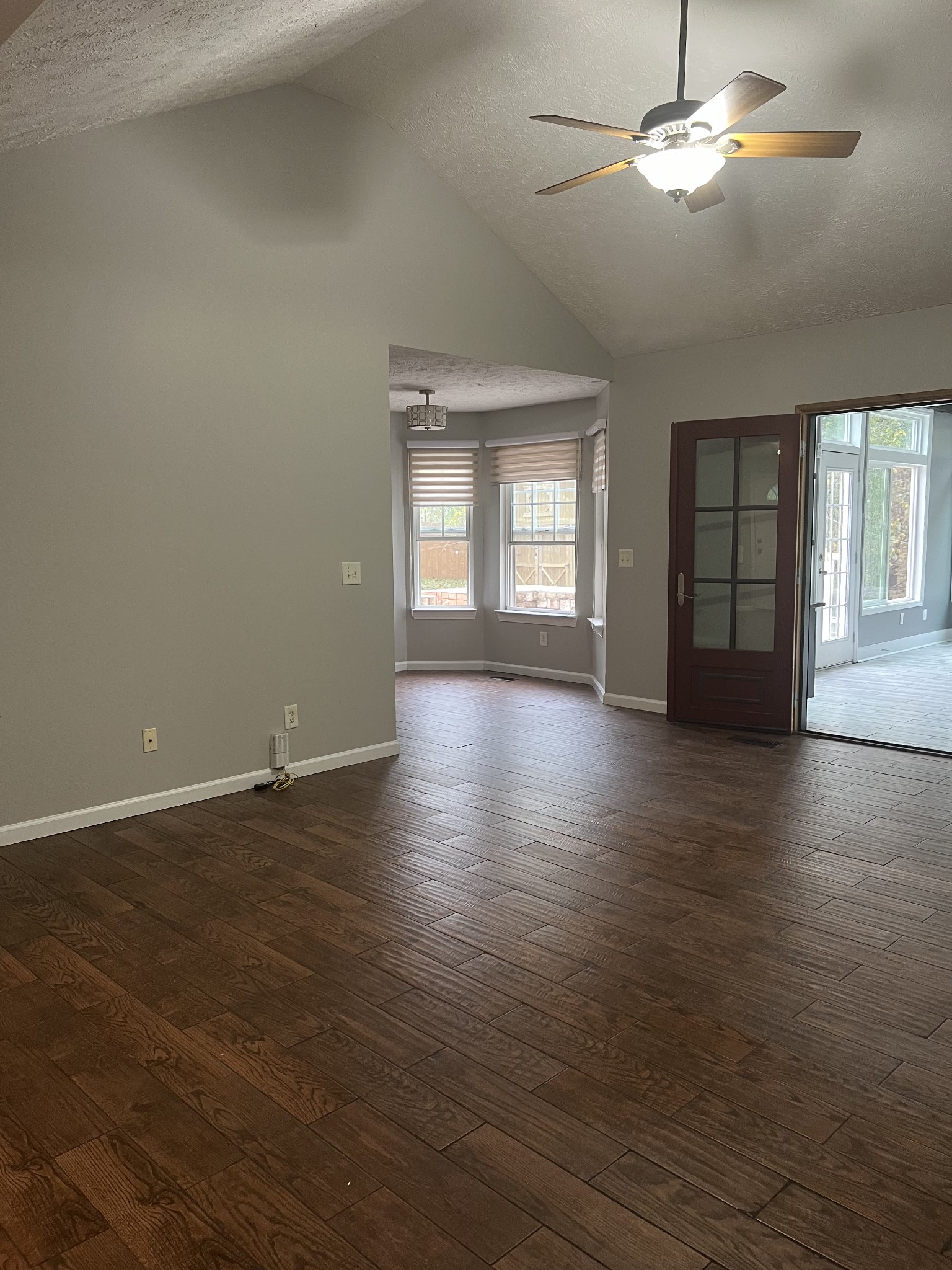 4266 Birmingham Road Lebanon, TN 37090 - Photo 8 of 24 an empty room with wooden floor and windows