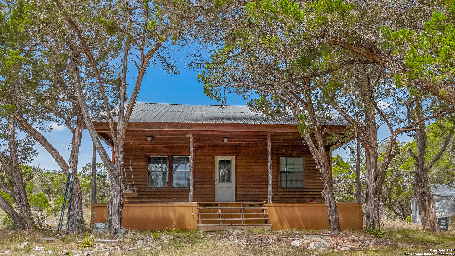 a house with trees in front of it