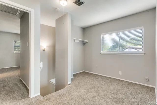 an empty room with a window