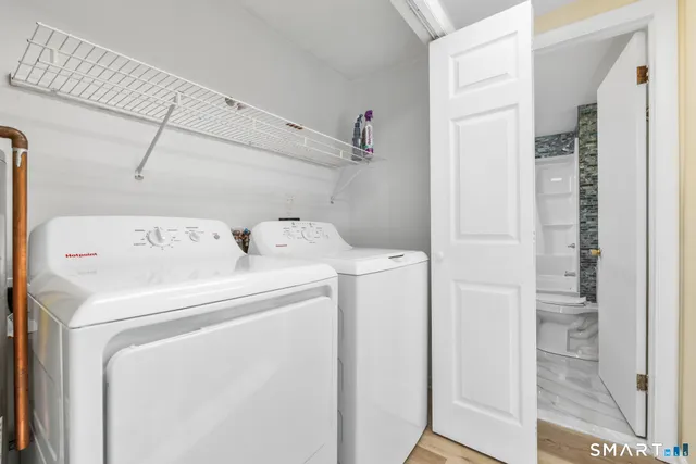 a utility room with dryer and washer
