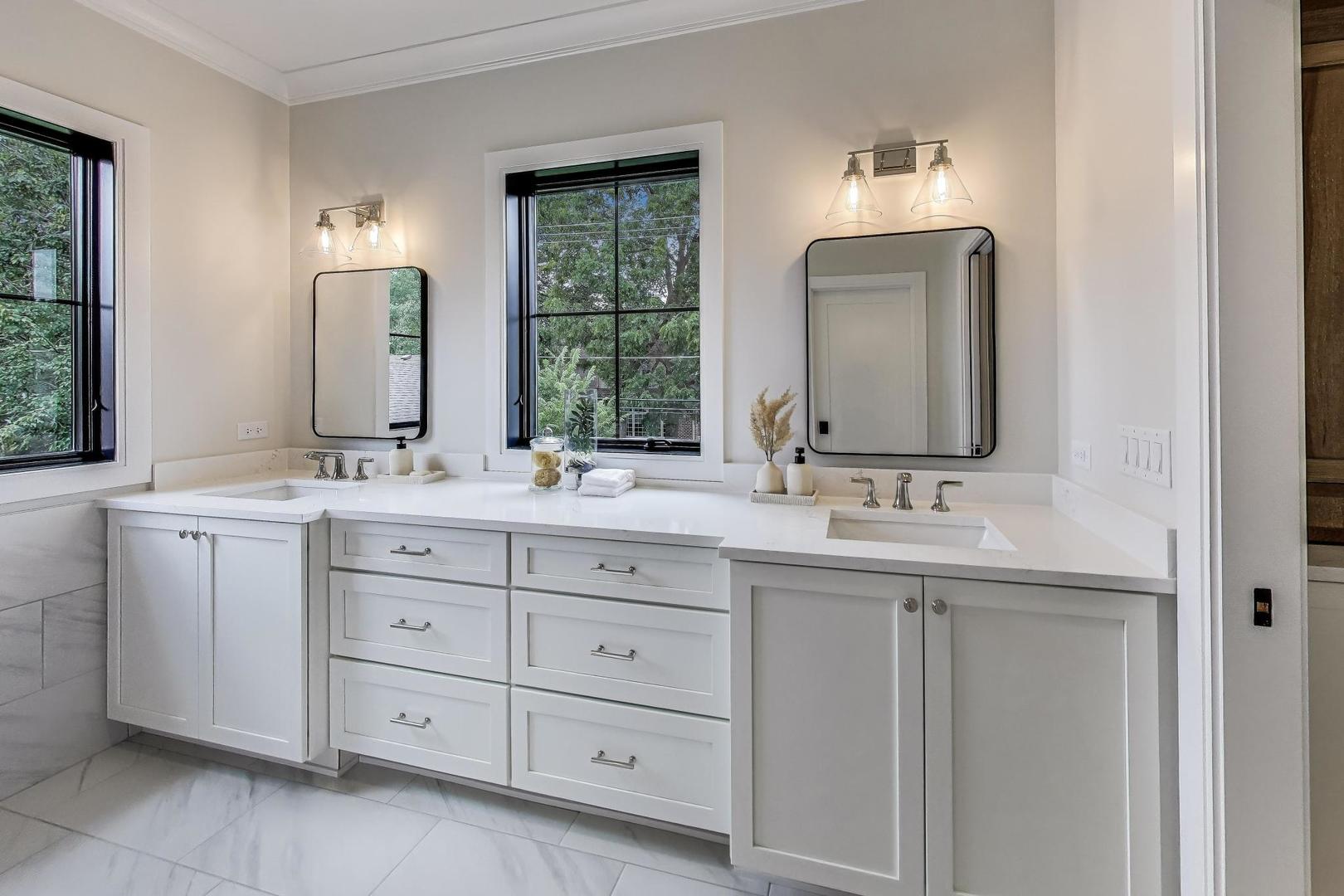 405 Ridge Avenue Clarendon Hills, IL 60514 - Photo 12 of 17 a bathroom with double sink and a mirror