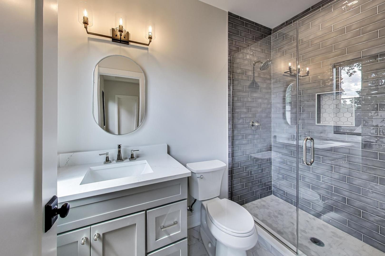 405 Ridge Avenue Clarendon Hills, IL 60514 - Photo 16 of 17 a bathroom with a sink toilet and shower