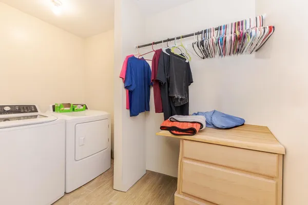 a utility room with dryer and washer