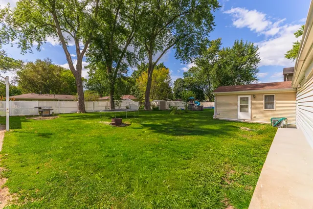 a view of a house with a big yard