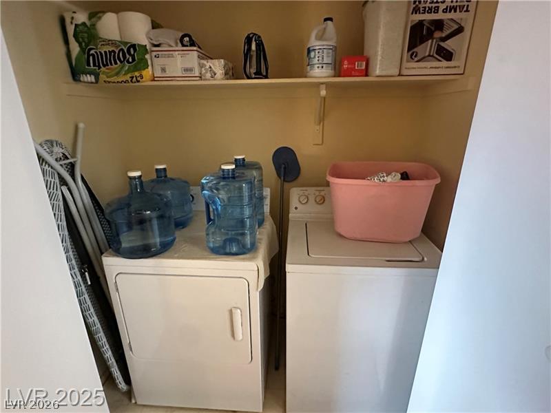 1830 North Pecos Road, Unit 230 Las Vegas, NV 89115 - Photo 14 of 16 A dedicated laundry space provides practical amenities for household needs.