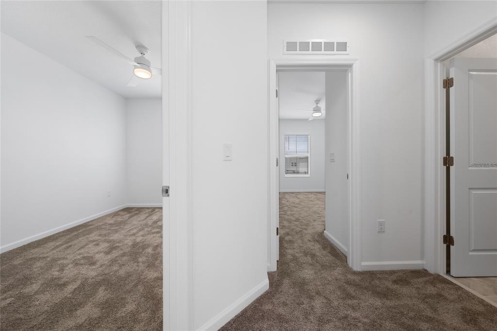 2587 Skyline Loop Kissimmee, FL 34758 - Photo 12 of 27 an empty room with closet