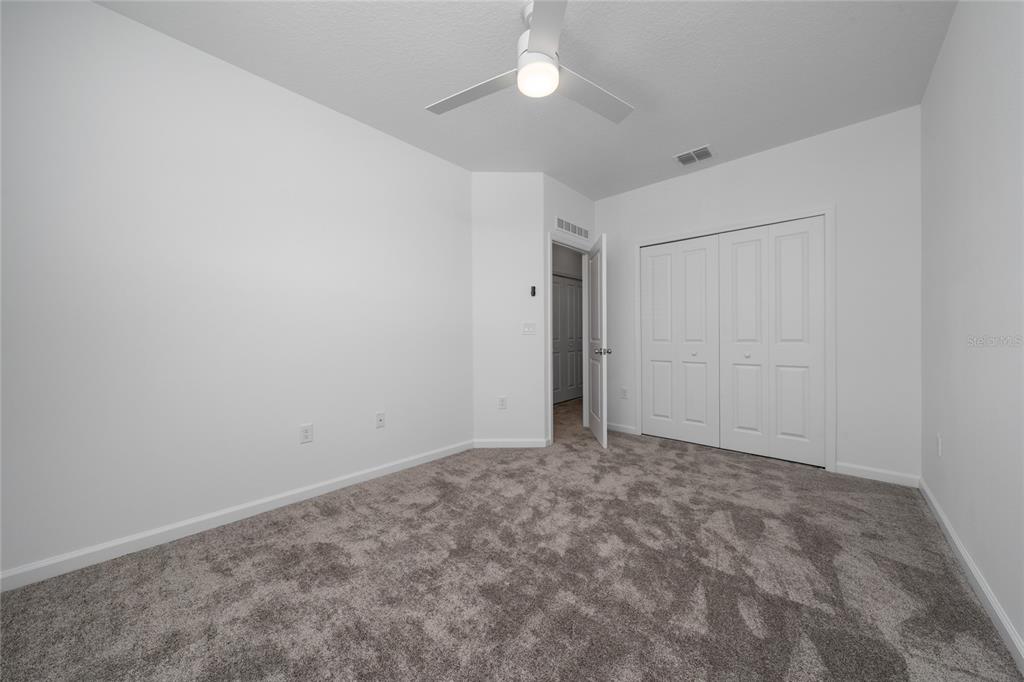 2587 Skyline Loop Kissimmee, FL 34758 - Photo 21 of 27 a view of an empty room