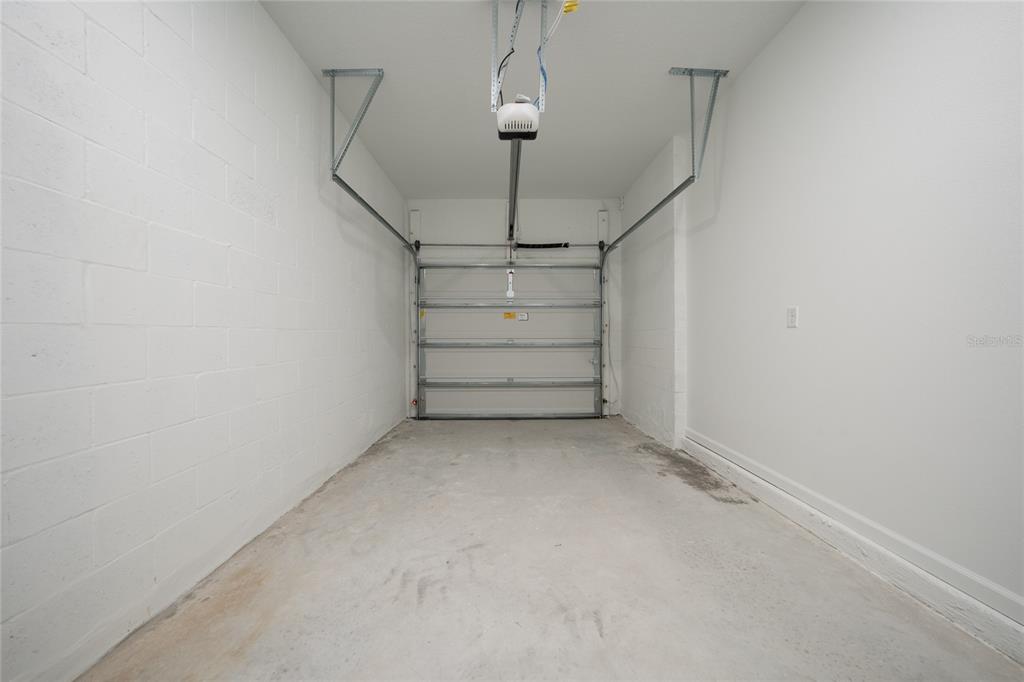 2587 Skyline Loop Kissimmee, FL 34758 - Photo 26 of 27 a view of a garage