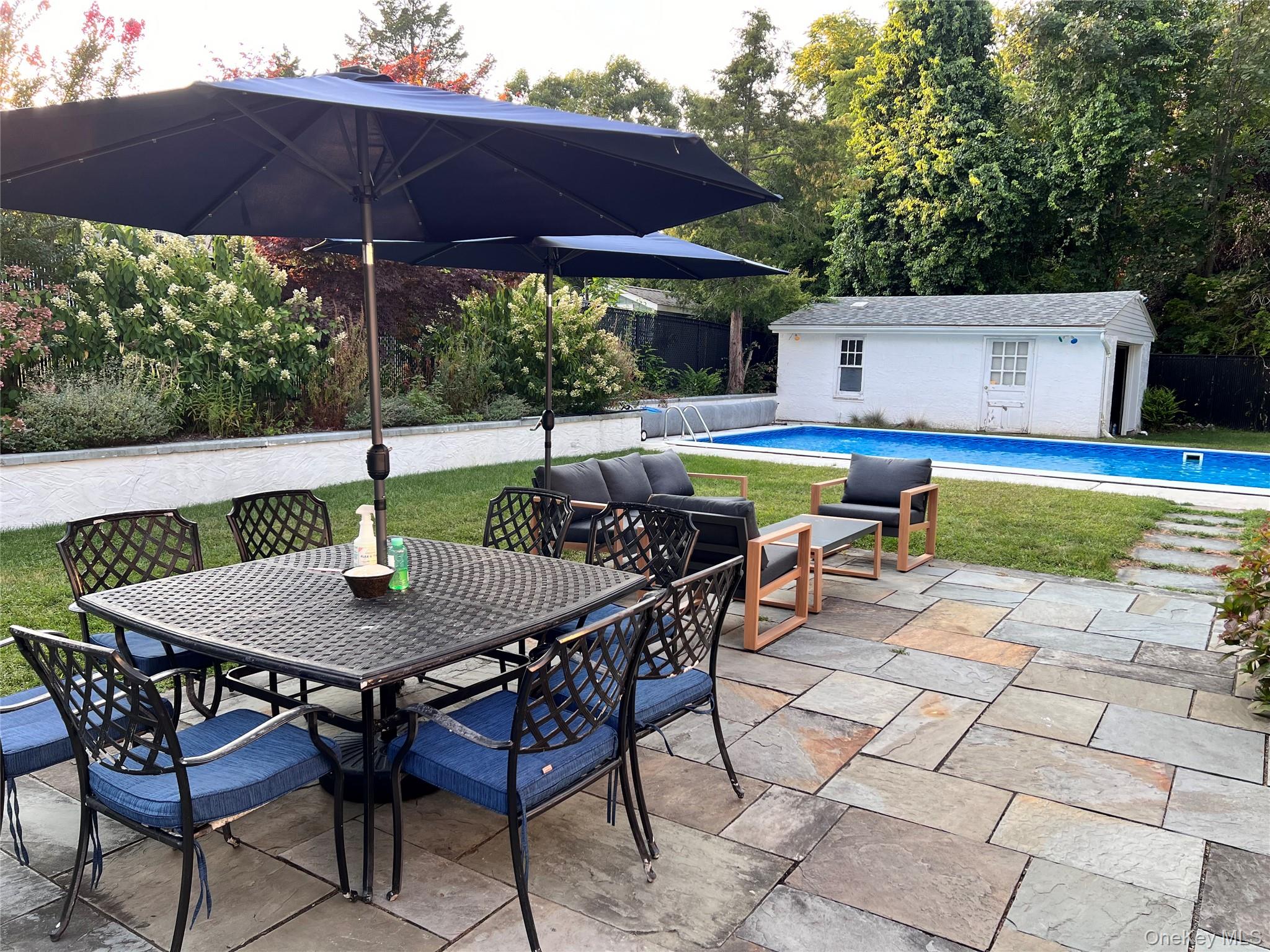 3825 Stars Road East Marion, NY 11939 - Photo 6 of 14 3825 Stars Road - In Ground Pool and Patio Area