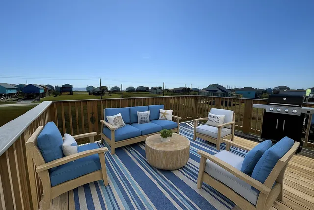 a terrace view with sitting space and outdoor seating