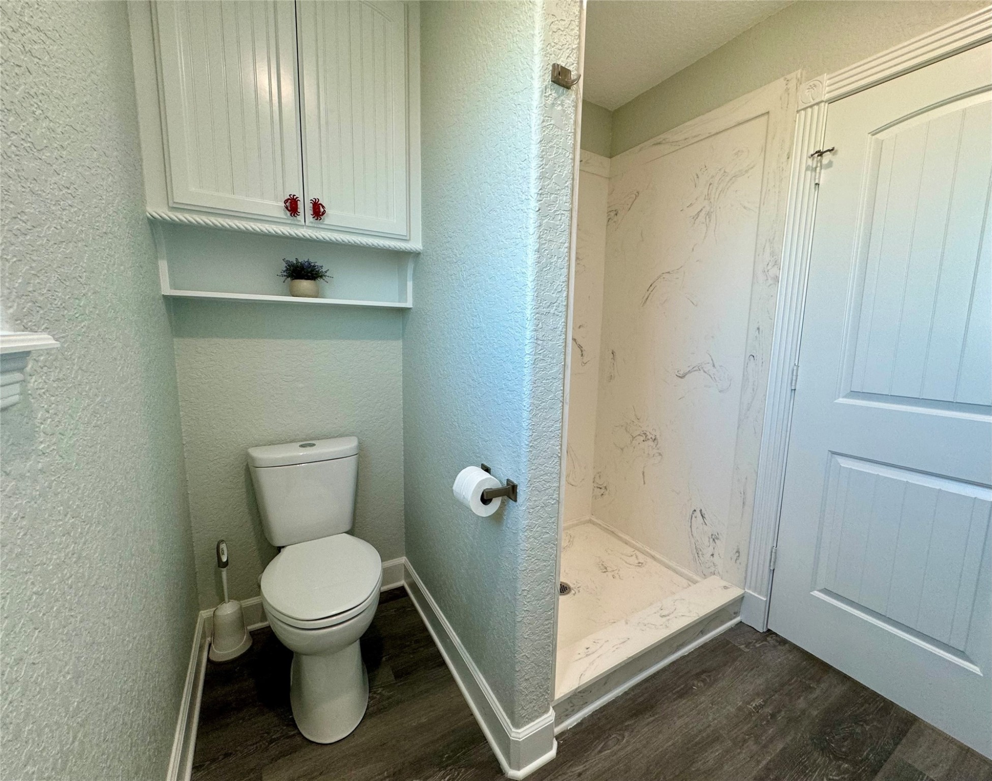 4822 Palm Street Surfside Beach, TX 77541 - Photo 20 of 32 Downstairs Full Bath with Marble Shower