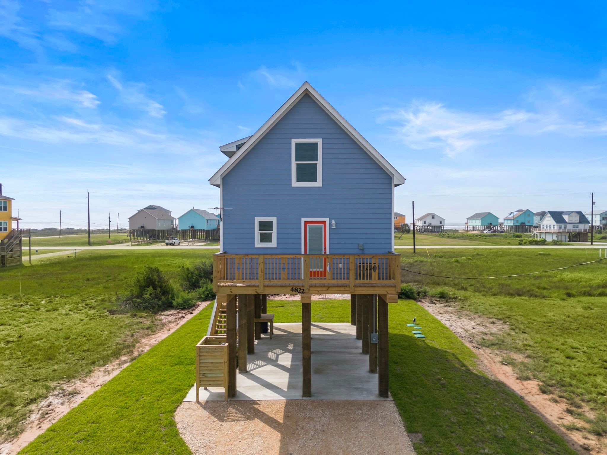 4822 Palm Street Surfside Beach, TX 77541 - Photo 5 of 32 Rear of the Home with Parking Underneath