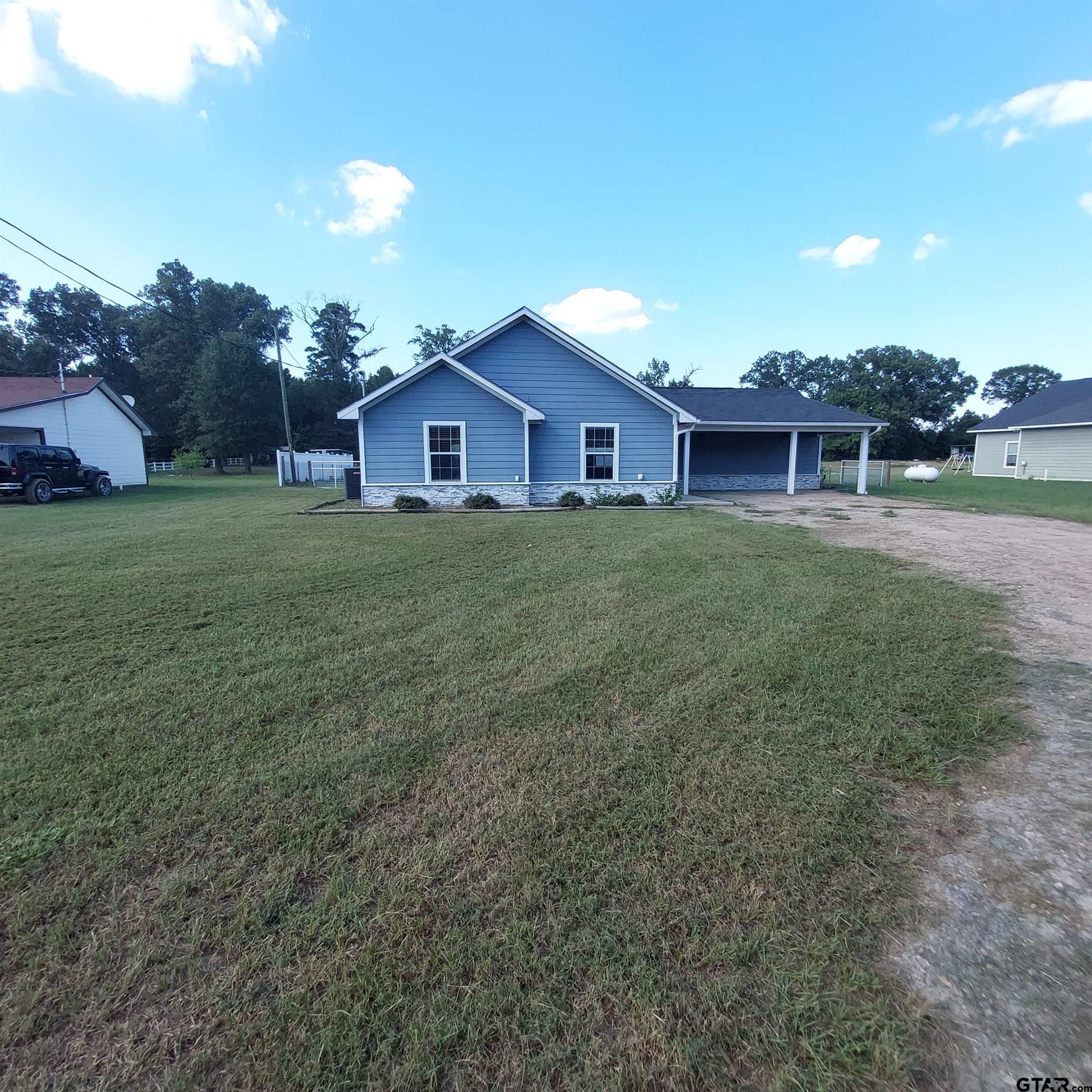1937 Highway 11 Pittsburg, TX 75686 - Photo 21 of 33 a house view with a garden space