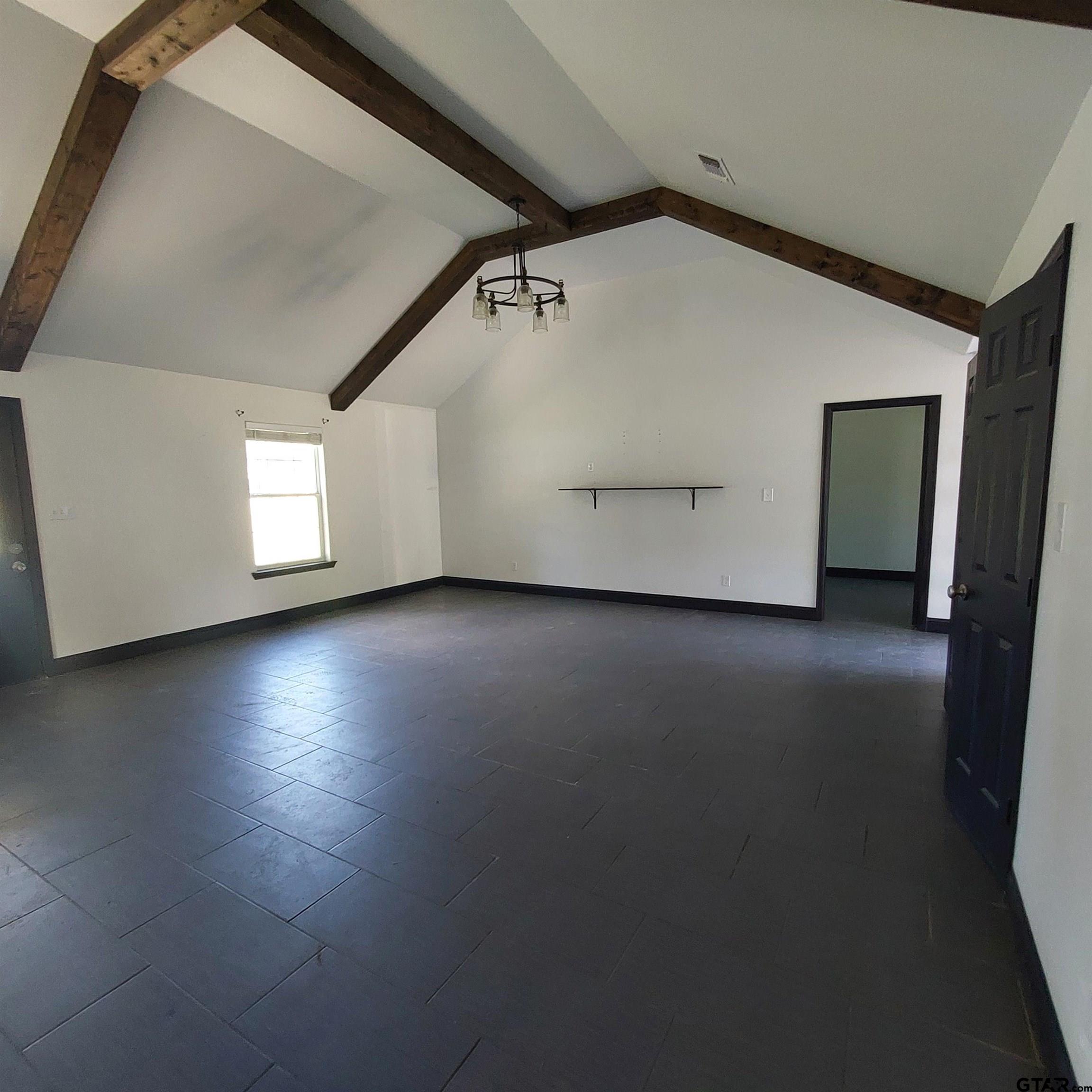 1937 Highway 11 Pittsburg, TX 75686 - Photo 4 of 33 a view of a livingroom with wooden floor and window