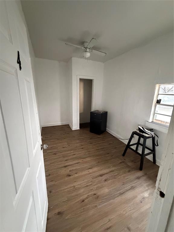 3528 Colonial Avenue Dallas, TX 75215 - Photo 7 of 32 a view of a livingroom with wooden floor and furniture