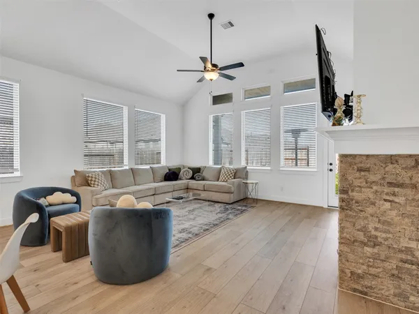 a living room with furniture and window