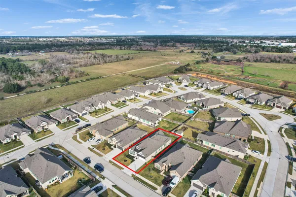 an aerial view of a city with ocean view