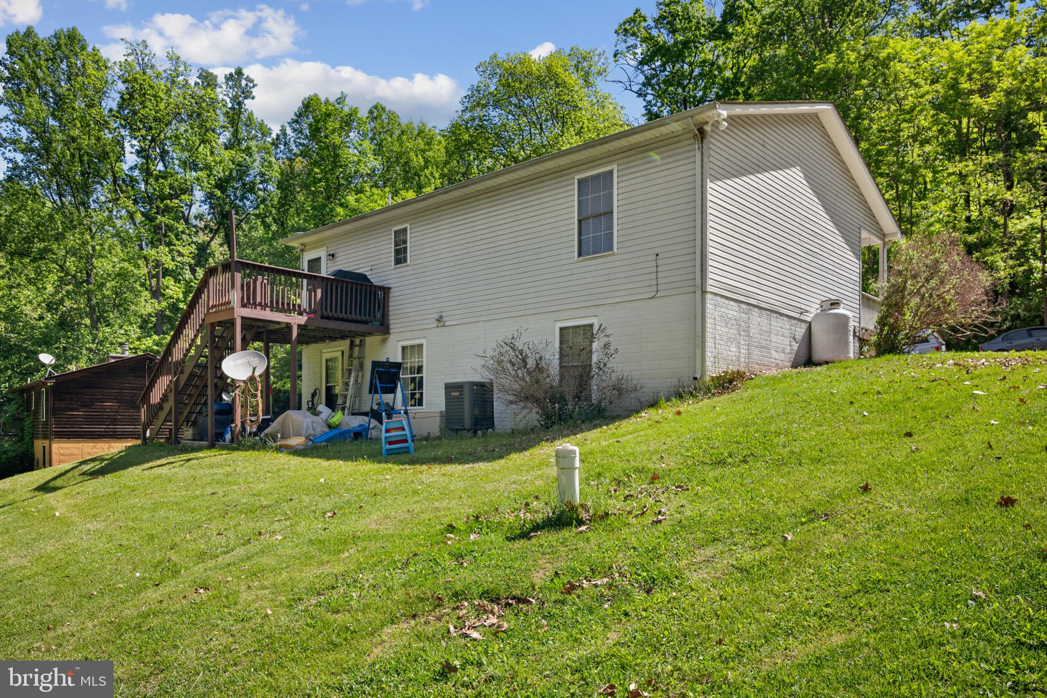 407 Freeze Road Linden, VA 22642 - Photo 23 of 28 Charming hillside retreat with greenery.