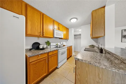 $215,000 | 2225 Buchtel Boulevard South, Unit 1007, Denver, CO 80210