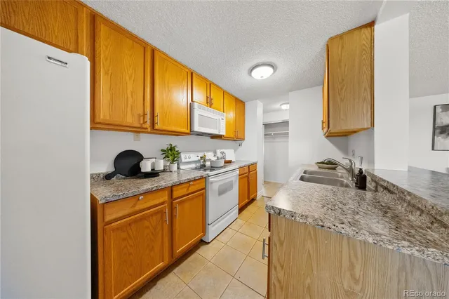 $215,000 | 2225 Buchtel Boulevard South, Unit 1007, Denver, CO 80210
