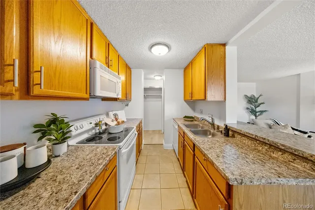 $215,000 | 2225 Buchtel Boulevard South, Unit 1007, Denver, CO 80210