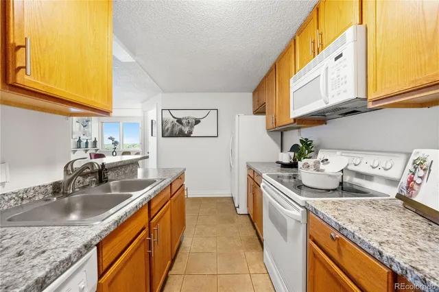 $215,000 | 2225 Buchtel Boulevard South, Unit 1007, Denver, CO 80210
