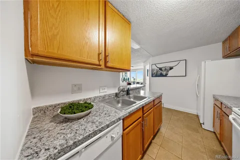 $215,000 | 2225 Buchtel Boulevard South, Unit 1007, Denver, CO 80210