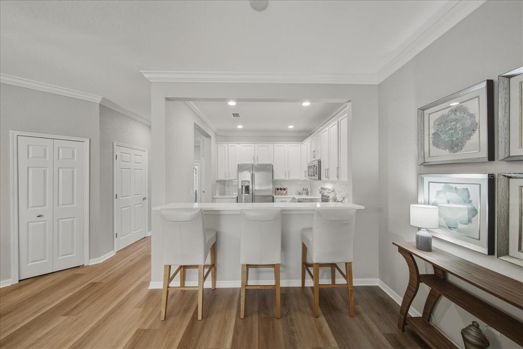 7224 Ketch Place Bradenton, FL 34212 - Photo 15 of 70 a kitchen with a table and chairs in it