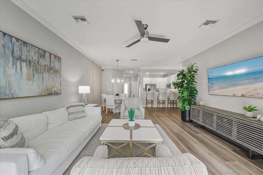 7224 Ketch Place Bradenton, FL 34212 - Photo 23 of 70 a living room with furniture and a large window
