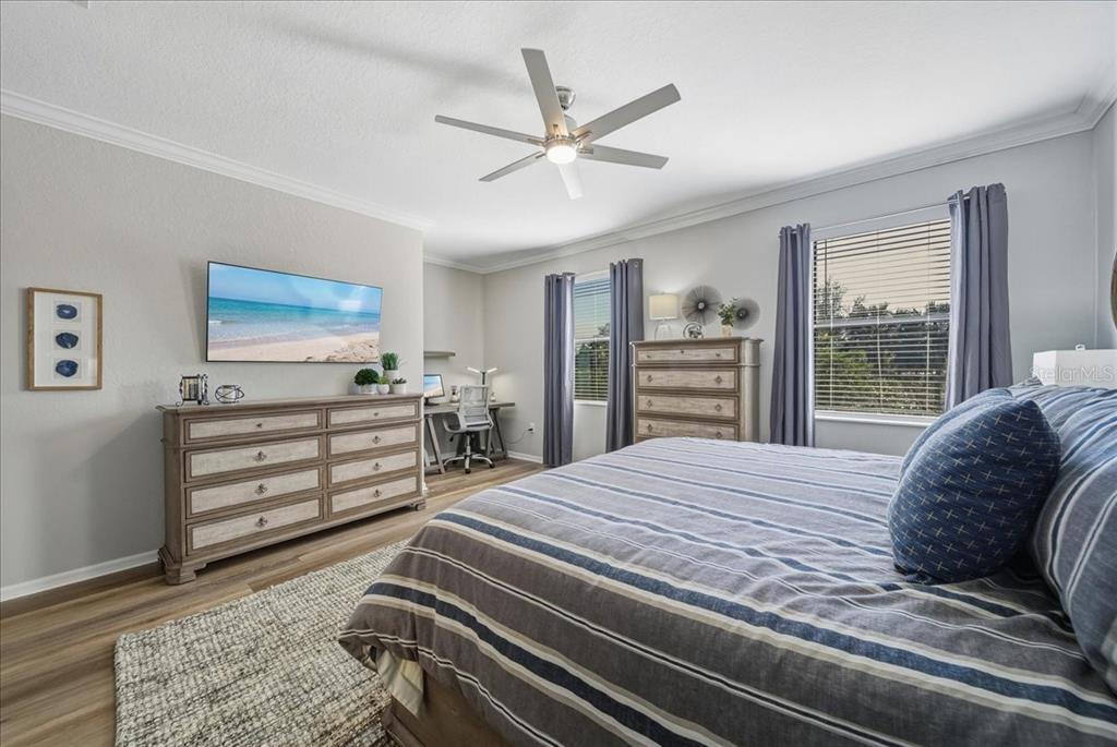 7224 Ketch Place Bradenton, FL 34212 - Photo 27 of 70 a bedroom with a bed and a dresser