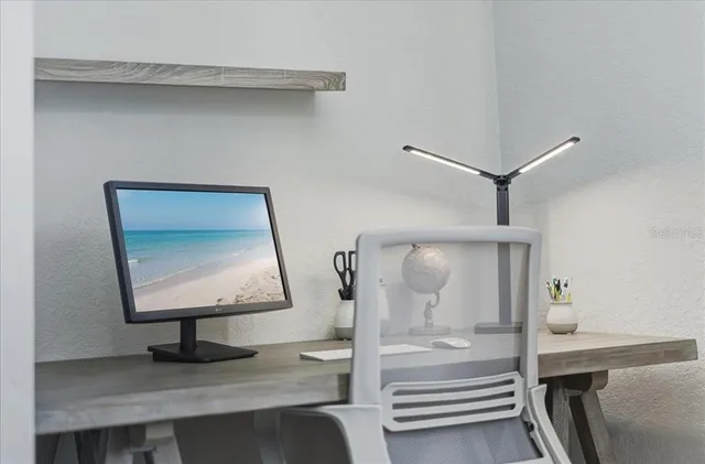 a view of front door with wooden floor