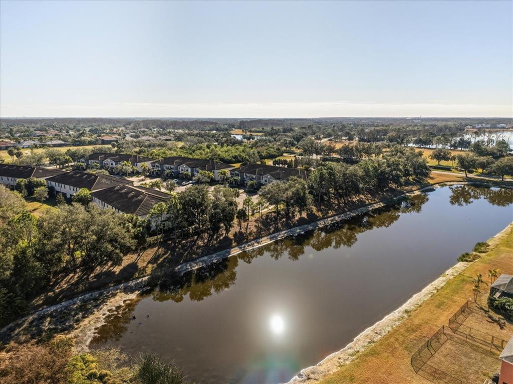 7224 Ketch Place Bradenton, FL 34212 - Photo 66 of 70 an aerial view of ocean and residential houses with outdoor space